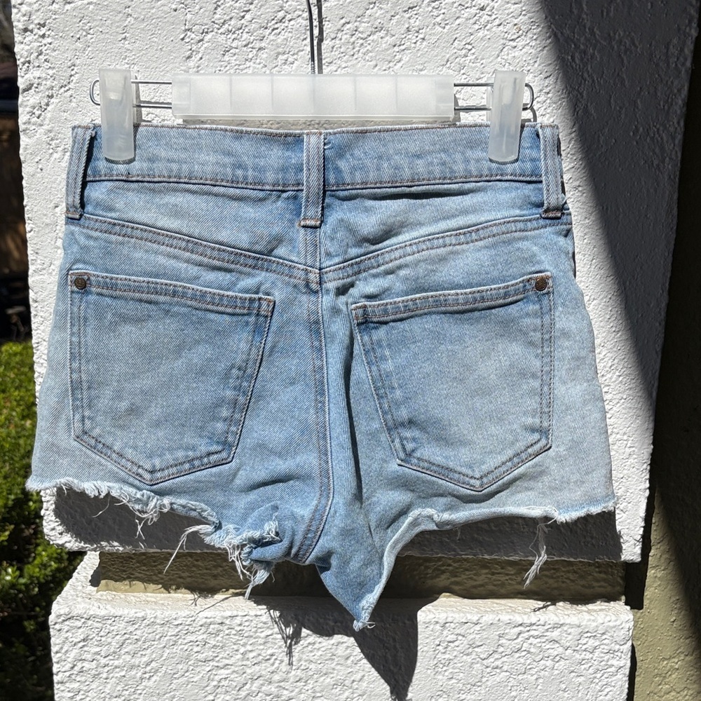Celebrity Pink Light Wash “The Brat” Ripped Jean Shorts - Picture 3 of 7